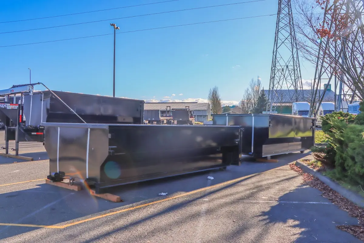 Roll-off dumpster ready for waste disposal at job site for 2 Yard Dumpster Rental in Forest Lake